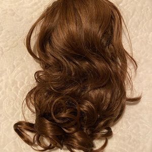 14” new, never worn fake pony brown.